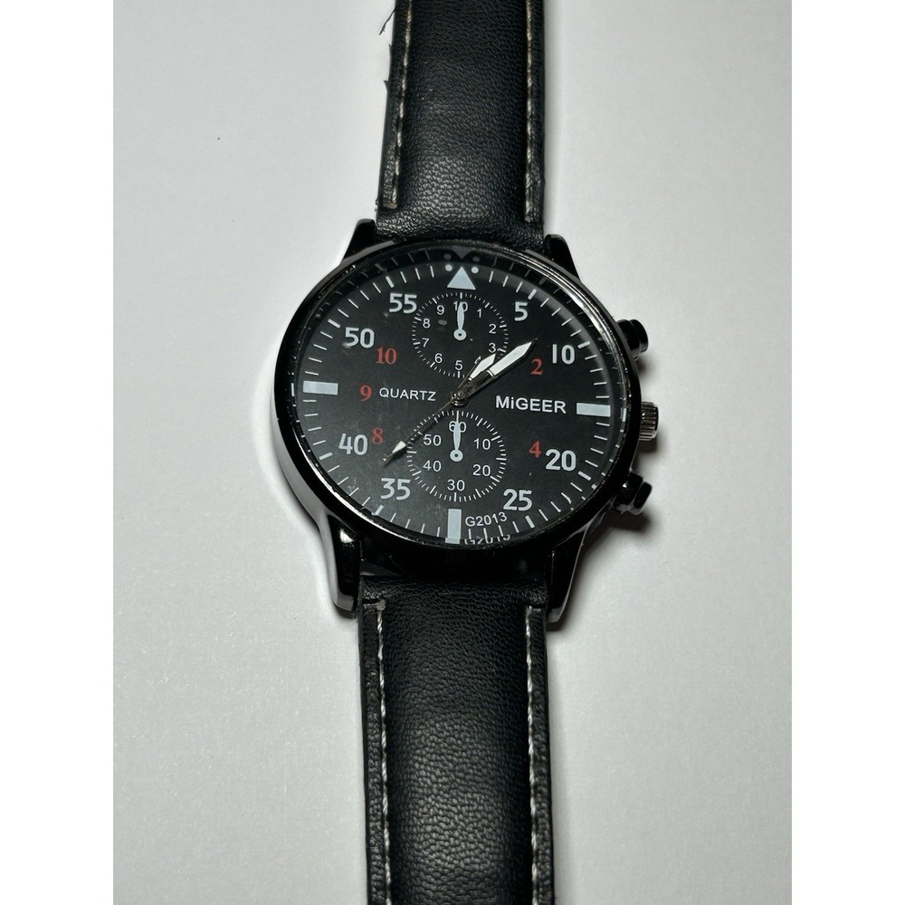 Men's Migeer Quartz Wristwatch  Black Leather Band. Needs New Battery
